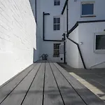 Vibrant Spring Street With Garden
